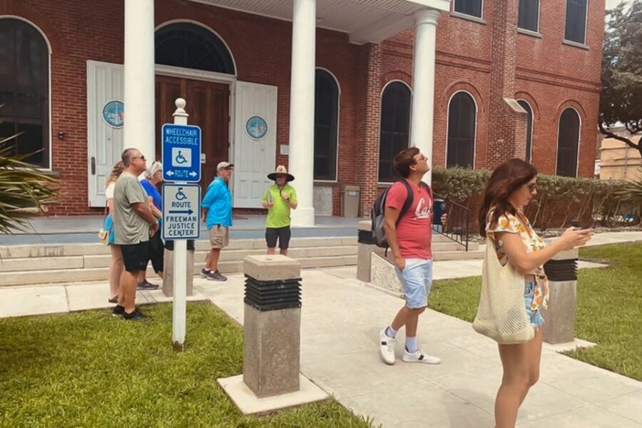 Key West: Hemingway's Life and Local Food Walking Tour - Bookstore photos, train connections, and the neighborhood texture
