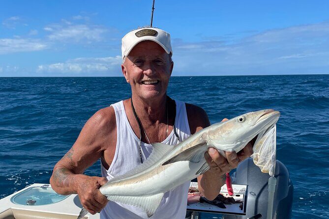 Key West Sandbar Fishing Snorkel Catch and Cook Excursions - Fishing for dinner: landing snapper and keeping kids included