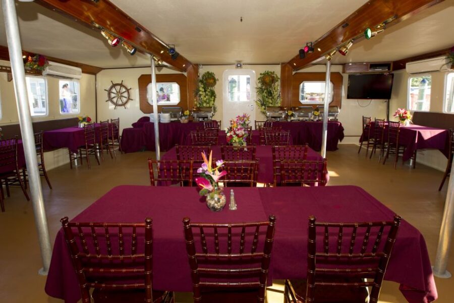 Key West: Sunset Dinner Cruise with Open Bar & Live Music - Meeting The Party Cat: Where to start your Key West sunset night